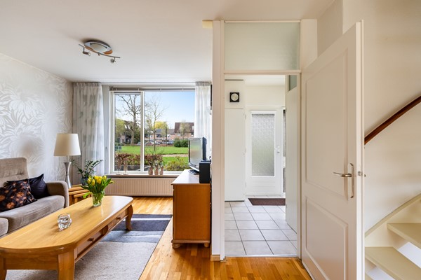 Foto - Te koop: tussenwoning gelegen aan groenvoorziening